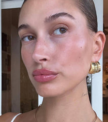 Hailey Bieber with balanced, hydrated skin