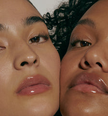 two models wearing peptide lip treatment