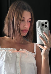 Hailey Bieber holding Lip Case