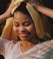 model with glazed, hydrated skin