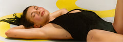 HB lying on a giant float with rhode logo