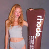 model holding a giant pbj lip tint