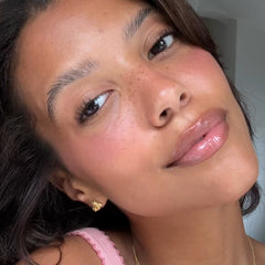 michaela wears peptide lip tint jelly bean