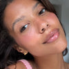 michaela wears peptide lip tint jelly bean