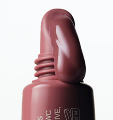 close up of peptide lip tint salty tan