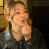 creator wearing peptide lip shape