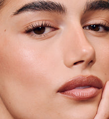 Maia wears peptide lip shape in lean