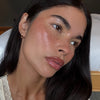 creator wears peptide lip tint in pbj, pocket blush in toasted teddy, peptide lip shape in lean