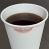 peptide lip tint stain on a coffee cup