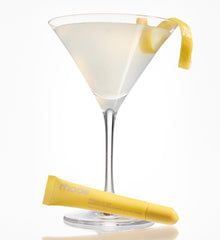 peptide lip tint lemontini with a glass of cocktail