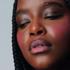 model wears pocket blush in juice box