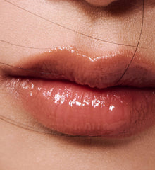 model wears peptide lip tint
