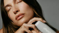 hailey bieber holding glazing mist