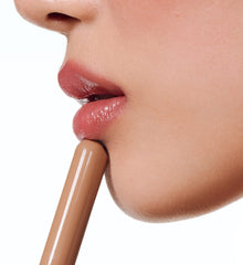 close up of model's lip with peptide lip shape