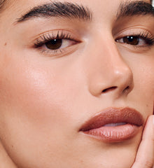 model wearing peptide lip shape in lean