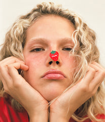 anna with rhode strawberry sticker
