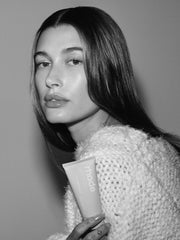 Hailey Bieber holds barrier restore cream