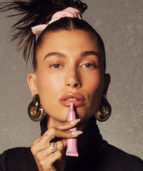 Hailey Bieber wearing ribbon lip tint on lips