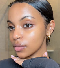 Creator Mia Moore with hydrated, balanced skin after applying the rhode skincare routine