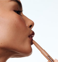model wearing peptide lip shape