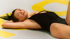 HB lying on a giant float with rhode logo