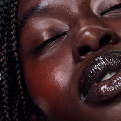 model wearing peptide lip tint in lemontini and pocekt blush in sun soak
