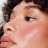 model wears pocket blush in tan line