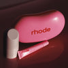 the birthday duo, featuring peptide glazing fluid, peptide lip tint in jelly bean, and a jelly bean shaped reusable pouch