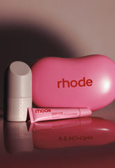 the birthday duo, featuring peptide glazing fluid, peptide lip tint in jelly bean, and a jelly bean shaped reusable pouch