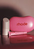 the birthday duo, featuring peptide glazing fluid, peptide lip tint in jelly bean, and a jelly bean shaped reusable pouch