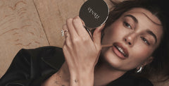 hailey bieber with rhode mirror and peptide lip shape