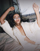 model wears rhode peptide eye prep