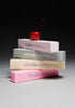 a stack of 4 peptide lip treatment boxes
