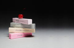 a stack of 4 peptide lip treatment boxes 