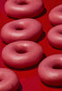 a group of Krispy Kreme Strawberry Glazed Doughnuts