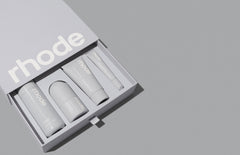 the rhode kit opened: includes Glazing Milk, Peptide Glazing Fluid, Barrier Restore Cream and Peptide Lip Treatment in Unscented