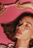 Hailey Bieber wears peptide lip tint in jelly bean