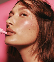 Hailey Bieber wears peptide lip tint in jelly bean on lips