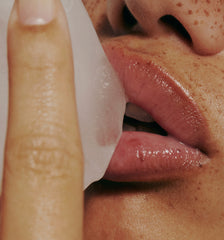 model lip close up, with ice cube