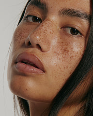 model with dewy, glazed skin