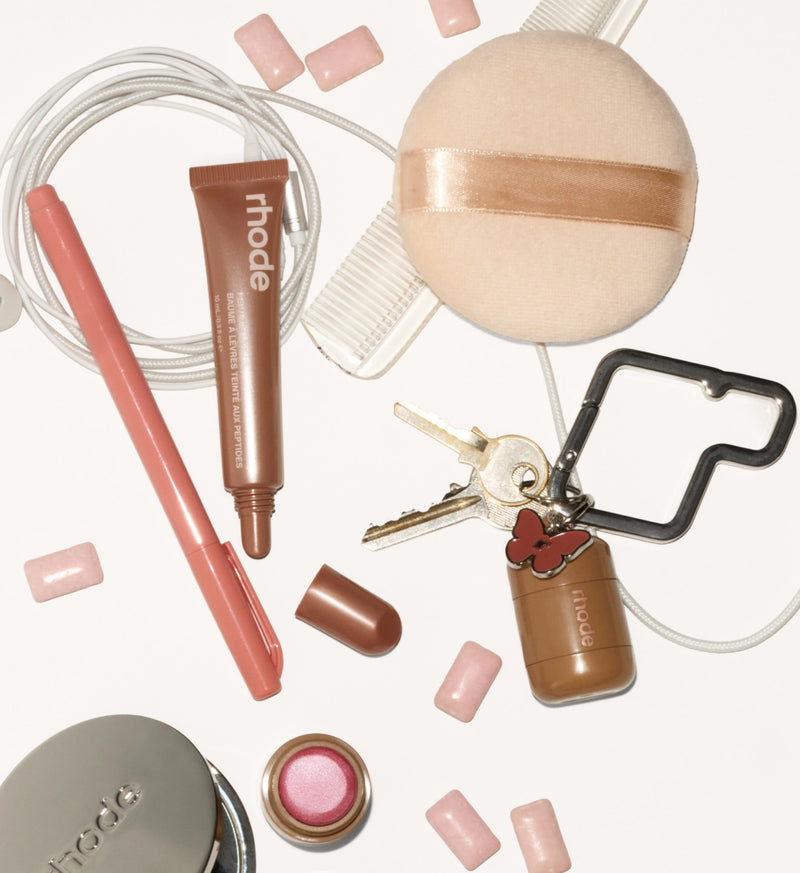 peptide lip tint sweet apple, pocket pearl, flutter charm, rhode carabiner, rhode mirror