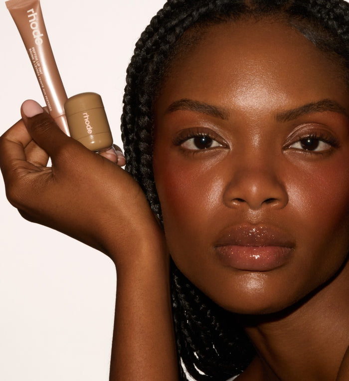 model with peptide lip tint sweet apple, pocket pearl