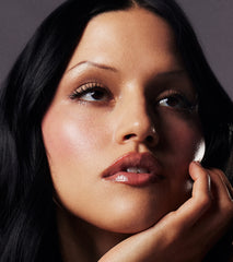 model with glossy lips wearing peptide lip treatment