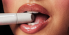 model with glossy lips biting peptide lip treatment