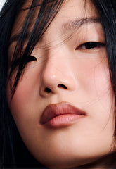 model wearing peptide lip shape in balance