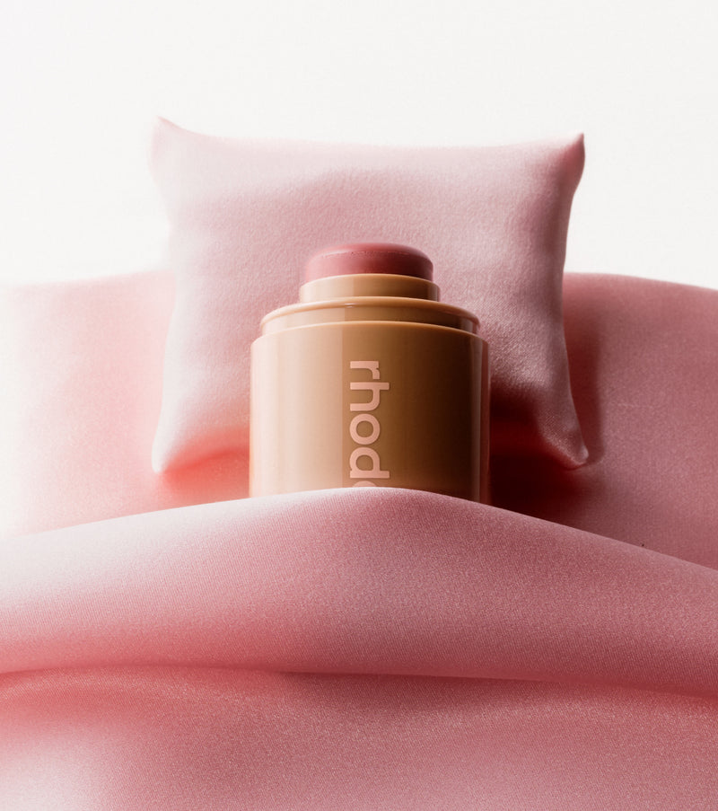 pocket blush sleepy girl in a baby pink blanket