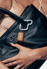 alexandra leclerc for rhode featuring carabiner charm and pocket pearl