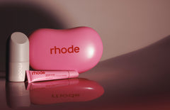 the birthday duo, featuring peptide glazing fluid, peptide lip tint in jelly bean, and a jelly bean shaped reusable pouch