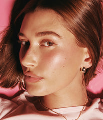 Hailey Bieber wears peptide lip tint in jelly bean on lips
