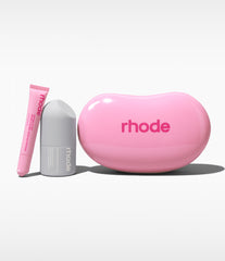 the birthday duo, featuring peptide glazing fluid, peptide lip tint in jelly bean, and a jelly bean shaped reusable pouch